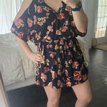 ASTR The Label Navy Floral Cold Shoulder Romper Photo 0