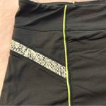 Athleta black torpedo shorts with neon piping and snakeskin print accent size XL Photo 1
