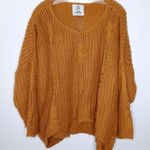 Unif  × Urban Outfitters burnt orange sweater size small Photo 0
