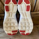 Nike athletic sneakers gray pink and yellow running tennis shoes athleisure Photo 5