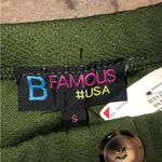 B famous green off the shoulder jumpsuit sz small fits like a xs or 3 Green Photo 1