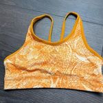Adidas  Women’s Medium Orange Patterned Sports Bra Photo 0