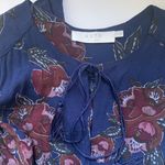 Revolve ASTR The Label long sleeve boho ruffle hem navy floral romper, size M Photo 1