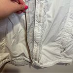 The North Face white wind breaker jacket size medium women’s Photo 2