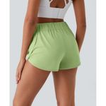 Halara  High Waisted Dolphin Hem Casual Shorts 2" Green Size Small NWT Photo 1