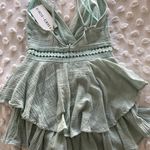 Saints + Secrets Romper Photo 2