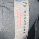 Free people movement top with circle cutout cross back Gray Photo 1