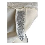 Free People -DONT YOU DARE Stunning cream color lace dress, sleeveless, lined, front keyhole opening, V back, skirt has some gold shimmer, excellent condition, size XS Measurements: Bust: armpit to armpit 15 inches Length: shoulder seam to bottom 33 inches Photo 12