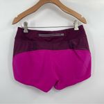 Athleta Women’s  Track This Run Shorts Fuchsia Zip Pocket Stretch size small Photo 3