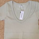 Garage Sonia Seamless Plunge Shirt Photo 0