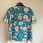 The Neck down medium light blue top Blue Photo 3