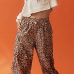 Free People Movement Zephyr Printed Pants Camel Combo Size Large NWOT Photo 0