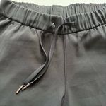 Lululemon athletica On The Fly Crop Woven 23β Black -Size 6 Photo 8