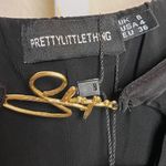 Pretty Little Thing Black Slinky Branded Trim Flared Jumpsuit Women's Size 4 Photo 7