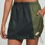 Nike  Sportswear Icon Clash Athleisure Woven Mini Skirt Green/Black Medium NWOT Photo 0