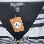EXPRESS Black and White Asymmetrical Zippered Tank Top Photo 1