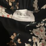 Le lis Women's Size Large Golda Black
Floral Faux Wrap Flowy Midi Skirt Like New Photo 7