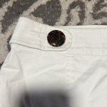 Lilly Pulitzer Lily Pulitzer white skirt. Size 8 has cheetah print buttons on front. Like new. Photo 1