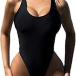 Elegant and timeless, this black swimsuit is perfect for any beach day. Enjoy a sleek and comfortable fit. Size XL Photo 0