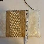 ELSIE…MADE IN THE BAHAMAS WHITE FAUX SKIN CLUTCH WITH STRAW DESIGN SNAP CLOSURE Photo 7