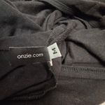 Onzie {M}  Women's Black Cropped Twist Back Top Blouse Photo 3