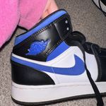 Nike Air Jordan 1 Mid Photo 1