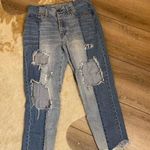 American Eagle  vintage hi-rise two tone distressed raw hem jeans Photo 0