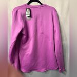 Under Armour NWT Women’s Purple  long sleeve top. Size large. Cold Gear fitted. Photo 4