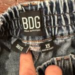 BDG urban Outfitters “skate” high rise denim shorts XS elastic waist Photo 3