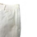 Revolve CHOOSY JEANS | 0 | Trouser Pants Eyelet Lace Embroidered Side Flare 30" Inseam Photo 1