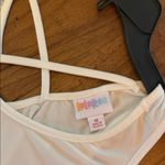 LuLaRoe  Cream Crisscross Back Tank Top Photo 3