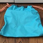 Adidas  Unisex Rumble II Sackpack, Onix Jersey/Bright Cyan/Onix/Chalk Cora Photo 2