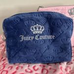 Juicy Couture royal blue velour makeup bag with silver crown logo embroidery on the front. Photo 0