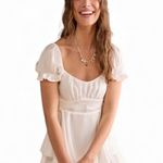 NWT Miami Francesca’s White Satin Tiered Puff Sleeve Romper Size M Photo 0