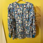 Peaches Uniforms Penguin Print Shirt with Blue and Yellow Accents Photo 3