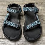 Teva  Women's Black and Teal Sandals Photo 2