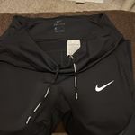 Nike  dri-fit running leggings size lg Photo 5