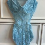 Elegant Blue Lace Bodysuit Size XS Photo 0