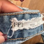 Free People  Blue Distressed Jean Shorts Photo 4