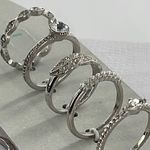 Boutique Assorted size 9 silver rings with new on card rings Photo 2