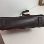 The Sak  soft knit multi colored striped crossbody purse.  Has a 70s/80s vibe Photo 4