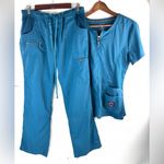 Koi Lite M Super Cute Turquoise Scrub 2 Photo 1