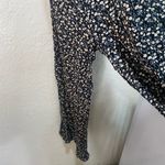 Lulu’s floral jumpsuit with slit sides size small Black Photo 1