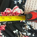 Torrid  black and pink dark floral babydoll stretchy short sleeve top size 1 Photo 4