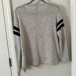 H&M  sheer light long sleeve with stripped sleeves in size medium Photo 5