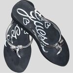 Guess  black foam sandals! Euc! Cute silver sparkle charm on front! Photo 1