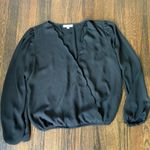 Nine Britton  black scalloped wrap top Photo 0