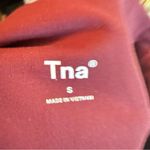 Aritzia TNA Bike Shorts Size Small Burgundy Activewear Outdoor Travel Stretch Red Photo 4