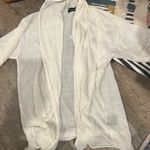 Isabella Rodriguez  small white sheer cardigan Photo 0