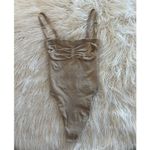 SKIMS Seamless Sculpt Strapless Thong Bodysuit Clay
Size Small Photo 1